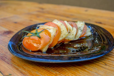 Close-up of fish in plate on table