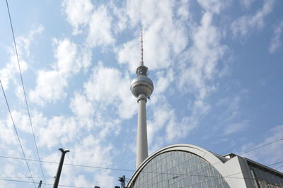 Low angle view of fernsehturm against sky