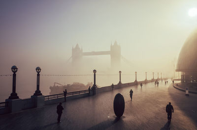 Scenic view of tower bridge and walkway in the morning