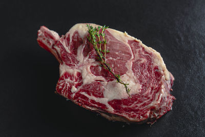 High angle view of ice cream on black background