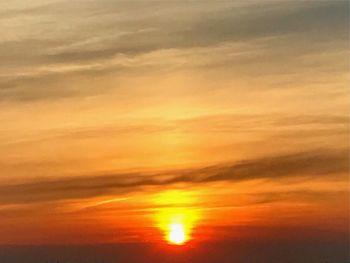 Scenic view of dramatic sky during sunset