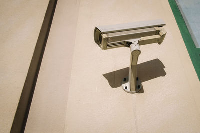 Low angle view of umbrella on metal