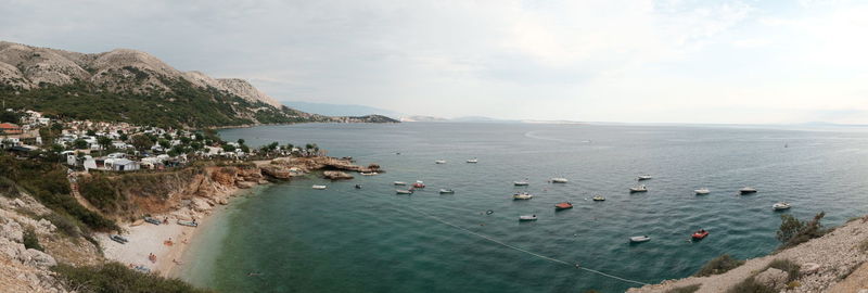 High angle view of bay against sky