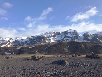 Scenic view of snowcapped mountains against sky