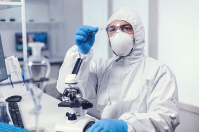 Portrait of female scientist working in laboratory