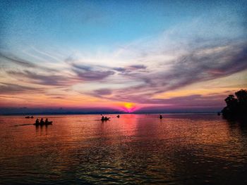 Scenic view of sea against orange sky