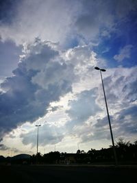 Low angle view of cable car against sky