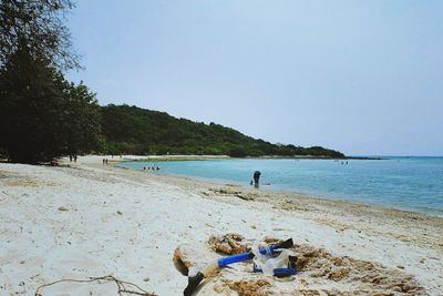 Scenic view of beach against clear sky