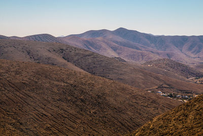 Scenic view of mountains against clear sky