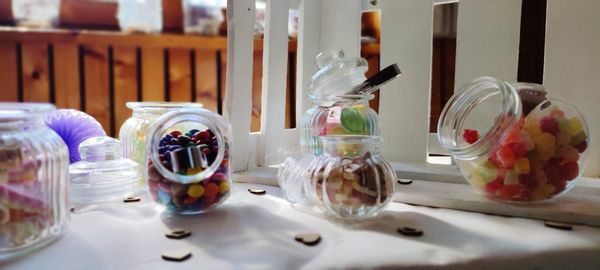 Close-up of glass jar on table
