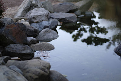 High angle view of stones in lake