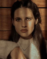 Close-up portrait of a serious young woman