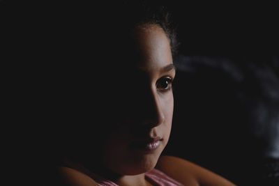 Close-up portrait of young woman