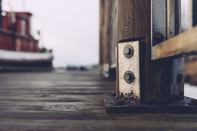 Close-up of wooden post on pier