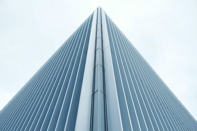 Low angle view of office building against sky