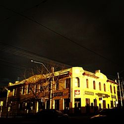 Low angle view of buildings against clear sky