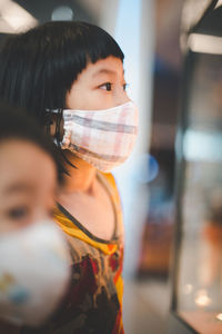 Close-up portrait of a serious young woman