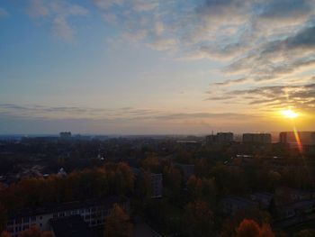 High angle view of townscape against sky during sunset