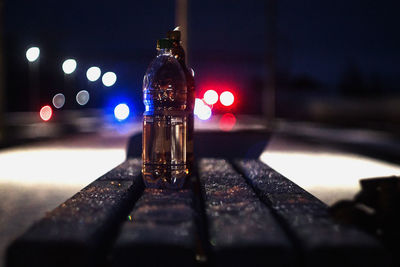 Close-up of illuminated bottle