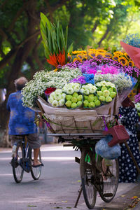 Mobile flower store on bicycle is one of iconic images in ha noi, vietnam