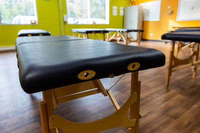 Close-up of empty seats on table