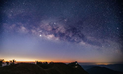 Scenic view of star field against sky at dusk