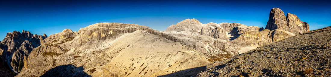 Dolomitic pass with cima undici and croda dei toni peaks panorama background south tyrol, italy