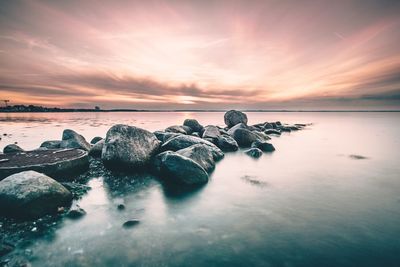 Scenic view of sea against sky during sunset