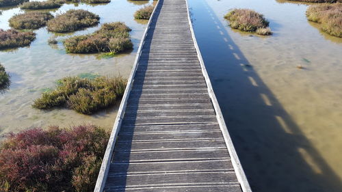 High angle view of footpath by road