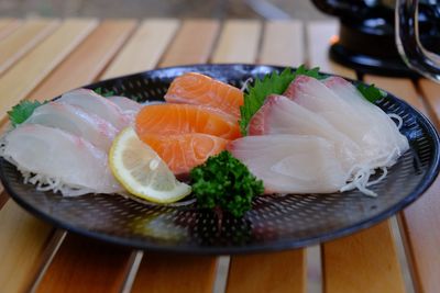 Close-up of fish served in plate on table