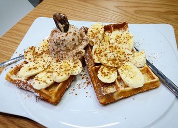 High angle view of breakfast served on table