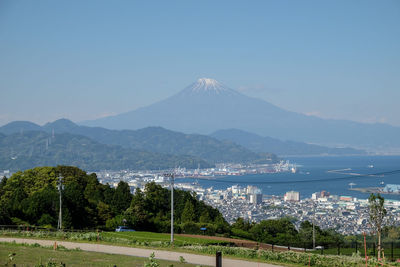 View of city against cloudy sky