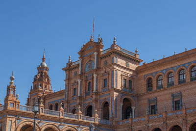 Low angle view of cathedral against clear blue sky