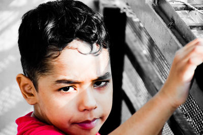 Close-up portrait of boy looking away