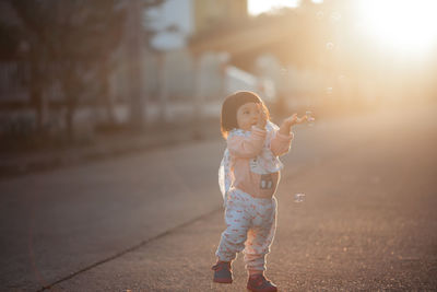 Girl standing outdoors