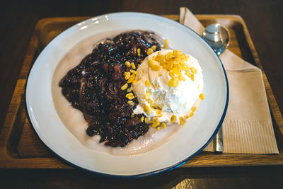 High angle view of breakfast in plate on table