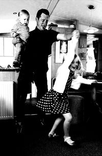 Men in shopping cart