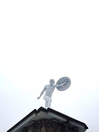 Low angle view of built structure against clear sky