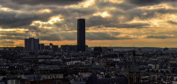 Cityscape against sky during sunset