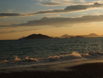 Scenic view of sea against sky during sunset