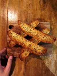 Close-up of hand holding bread