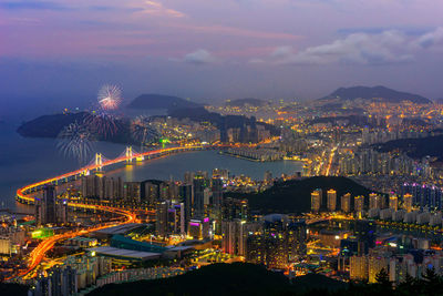 High angle view of illuminated buildings in city