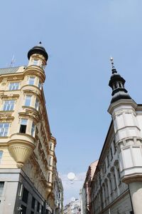 Low angle view of buildings against clear sky