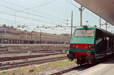 Train on railroad station platform against sky