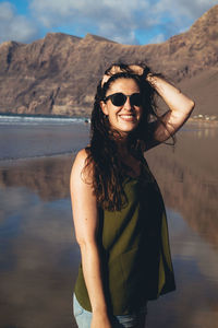 Portrait of young woman wearing sunglasses