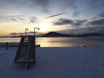 Scenic view of sea against sky at sunset