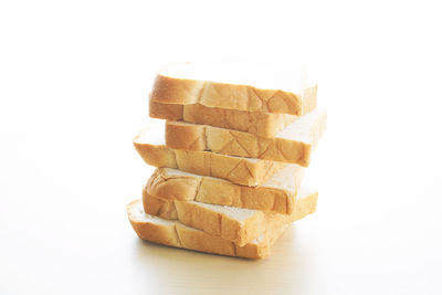 Close-up of stack against white background