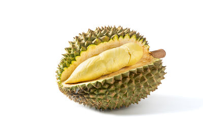 Close-up of fruit against white background