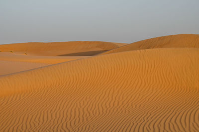 Scenic view of desert against clear sky