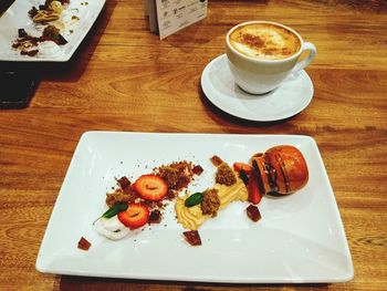 Close-up of coffee served on table